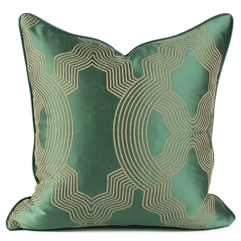 Emerald green geo jacquard cushion cover with deep emerald green satin and gold-toned geometric embroidery