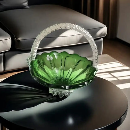 Emerald green glass fruit basket with twisted clear decorbites crystal handle and scalloped edges on dark table tray