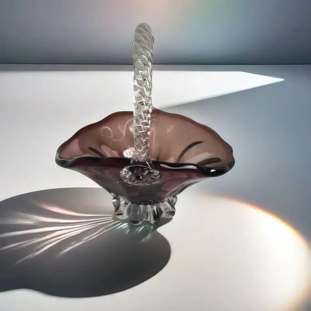 Translucent amethyst glass fruit basket with twisted clear decorbites crystal handle and fluted base tray