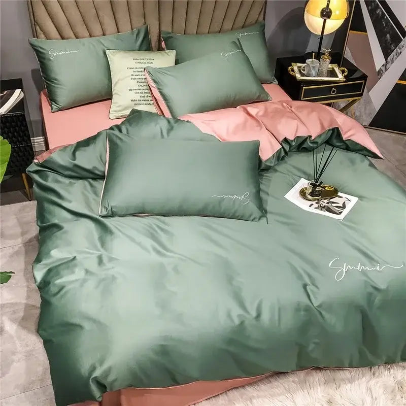 Emerald green and pink egyptian cotton bedding set with satin duvet cover featuring smmi embroidery detail