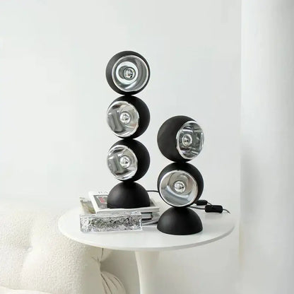 Black spherical engraved chrome yoyo dimmable led nordic table lamp with reflective silver interiors stacked in modern decorbites design