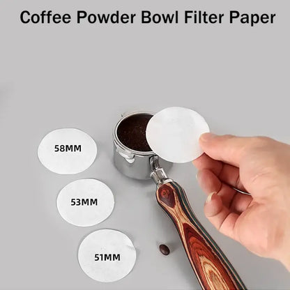 White circular decorbites coffee filter papers in various sizes 51mm 53mm and 58mm for espresso portafilter use