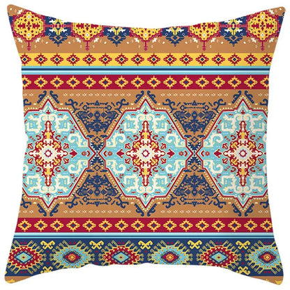 Vibrant ethnic bohemian geometric pillow cover with intricate tribal designs in blue red yellow and brown for living room decor