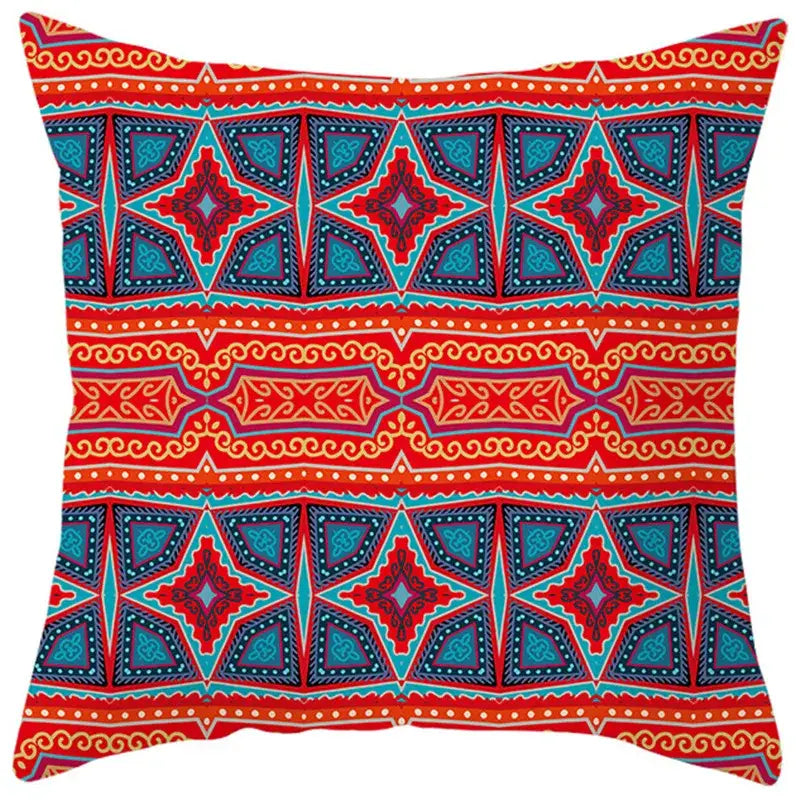 Vibrant red teal and navy ethnic bohemian geometric pillow cover with intricate tribal patterns for living room decorbites decor