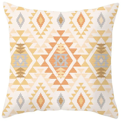 A square pillow cover with ethnic bohemian geometric pattern in beige orange and gray on cream for living room decor