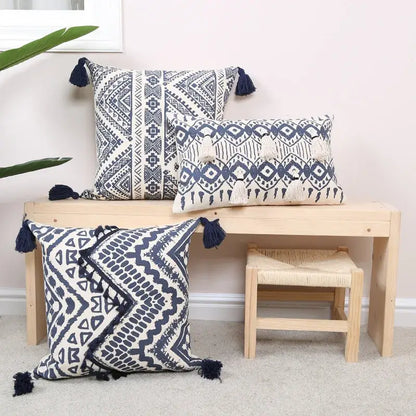 Three navy and white ethnic geometric printed cushion covers with tassels for living room decorbites cushion cover decor