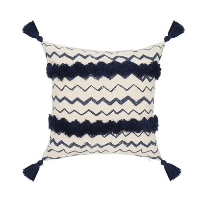 Cream-colored cushion cover with navy ethnic geometric printed zigzag patterns and tassel fringe for living room decorbites