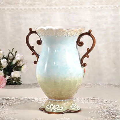 Delicate european floral elephant vase in white and pink ceramic with ornate handles and intricate detailing for decorbites decor