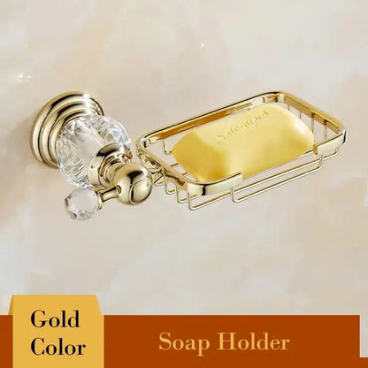 Gold-colored wall-mounted soap holder with crystal accents and rectangular wire basket for crystal bathroom towel rack decorbites