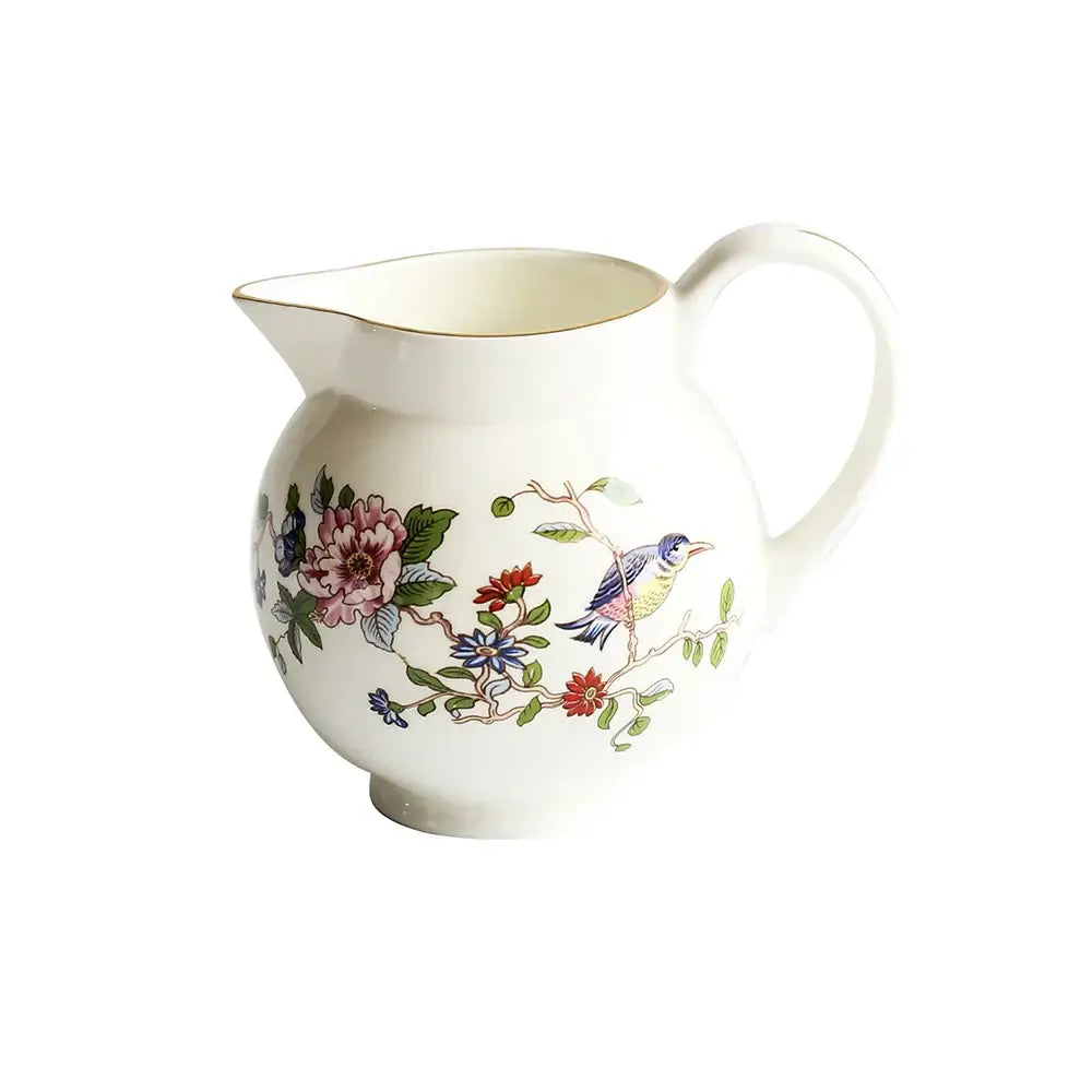 A white ceramic coffee set pitcher with exquisite hand-painted floral and bird design gold-trimmed for decorbites tea