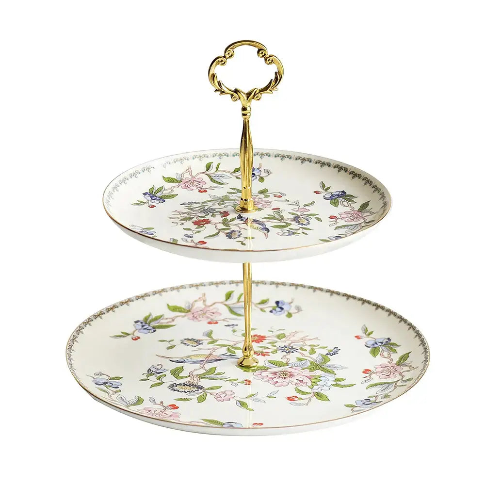 Elegant two-tier porcelain dessert stand with floral and bird motifs in pastels and polished gold handle for decorbites tea set