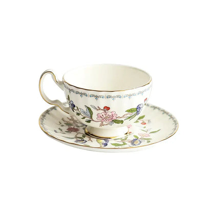 Exquisite floral porcelain coffee set featuring delicate pink blue green and red patterns with gold trim for dining room decorbites tea