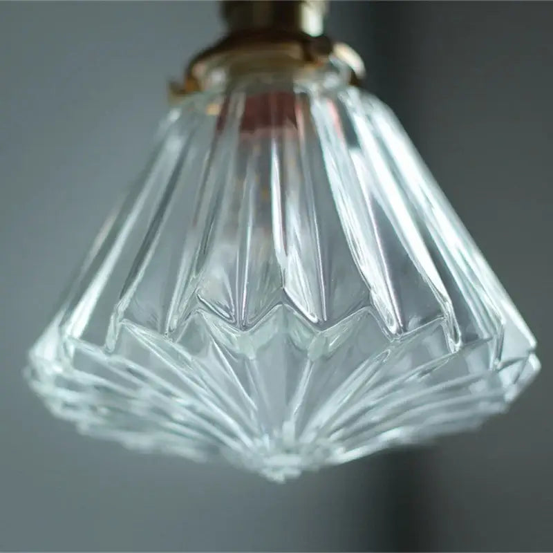 Faceted clear glass copper pendant lamp with brass fixture ideal for dining room and kitchen decorbites pendant lamp
