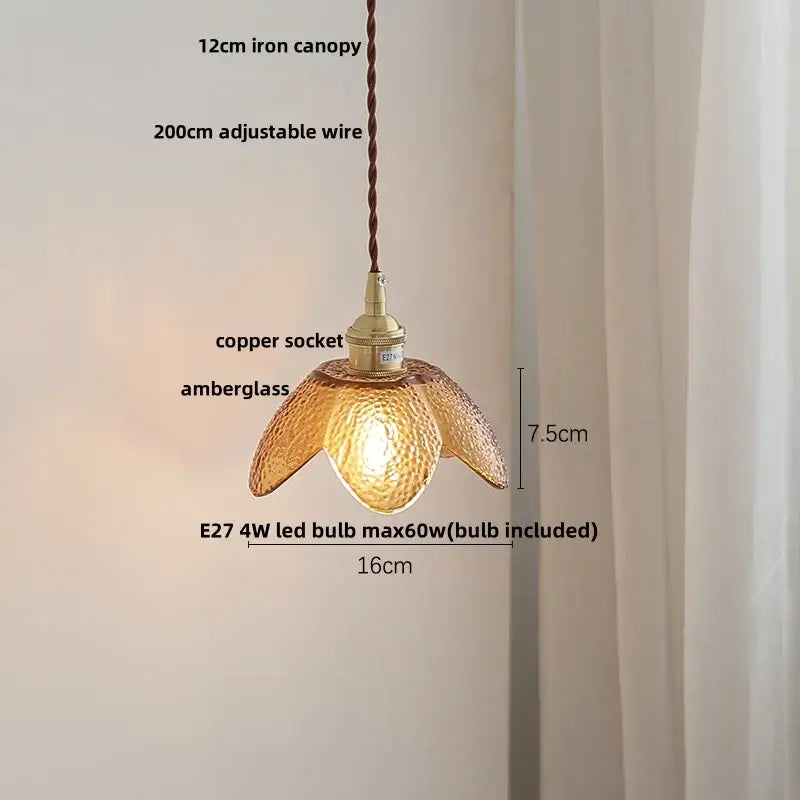 Faceted clear glass copper pendant lamp with warm amber textured petals and brass socket for dining room decorbites clear glass