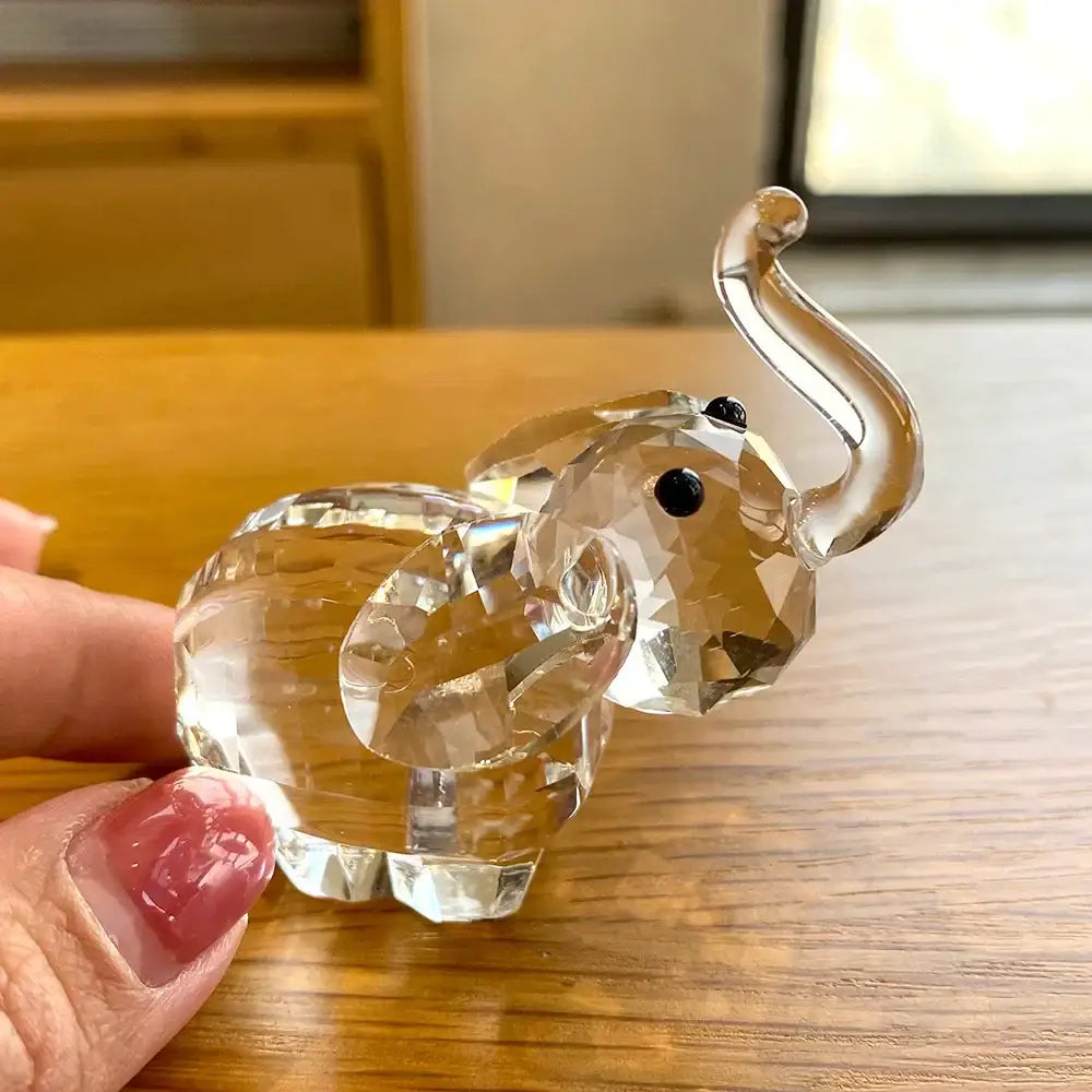 Faceted clear glass elephant figurine with black bead eyes and curved trunk for living room decorbites clear glass decor