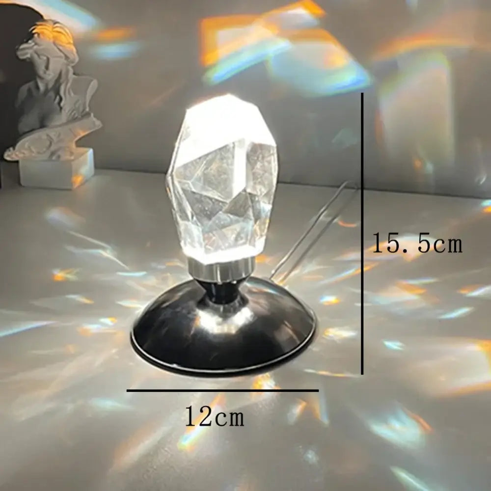Faceted crystal diamond table lamp with clear faceted crystal and silver base for elegant bedroom lighting