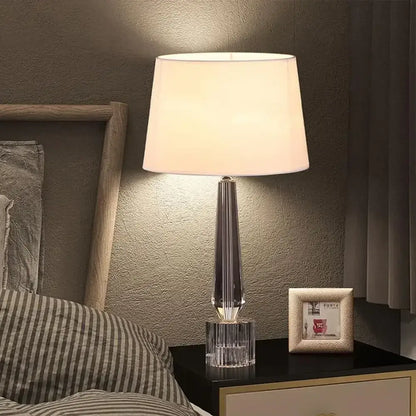 Faceted crystal table lamp with remote control featuring a clear crystal base and off-white shade for bedroom decorbites crystal table
