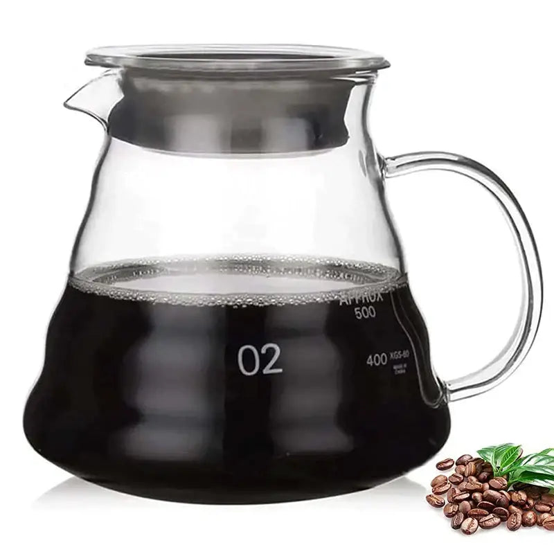 Faceted dark tinted diamond glass coffee carafe with transparent lid and filter cup filled with dark brewed coffee