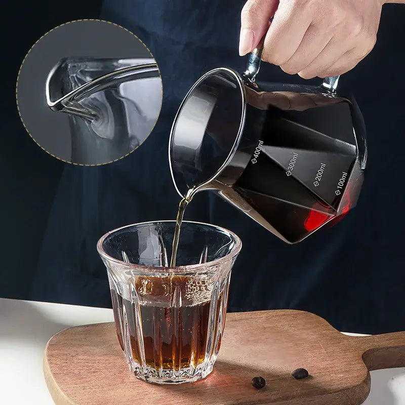 Faceted dark tinted diamond glass coffee carafe with silver-toned handle filter cup and measurement markings