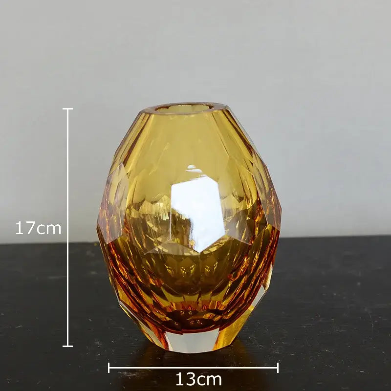 Faceted amber glass vase with geometric diamond-cut design and wider base from decorbites amber glass set for office desk