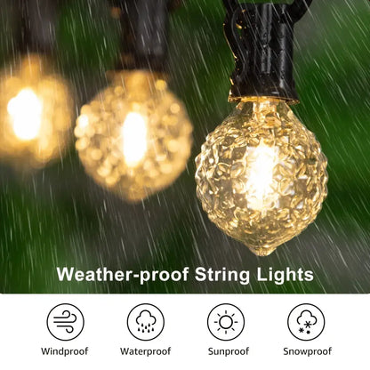 Faceted glass g40 string lights with golden textured globe bulbs on a black outdoor garden string light set