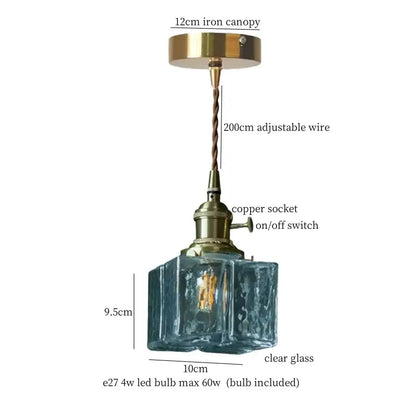 Faceted glass pleats led pendant light with brass iron canopy and copper socket suspended from adjustable wire