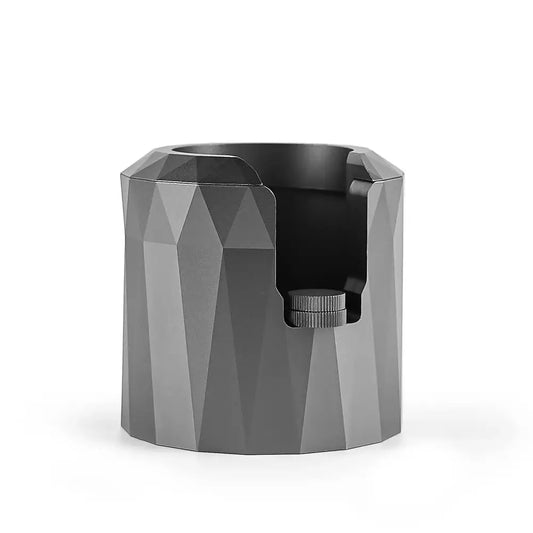 Black matte metal espresso portafilter holder with faceted design and adjustable clamp for kitchen espresso setup