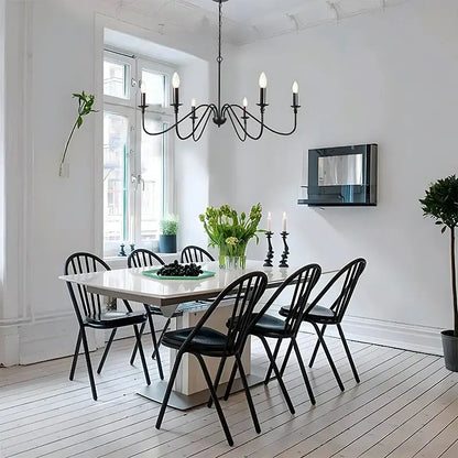 Farmhouse black 6-light chandelier made of wrought iron with candle-style bulbs by decorbites black for dining room decor