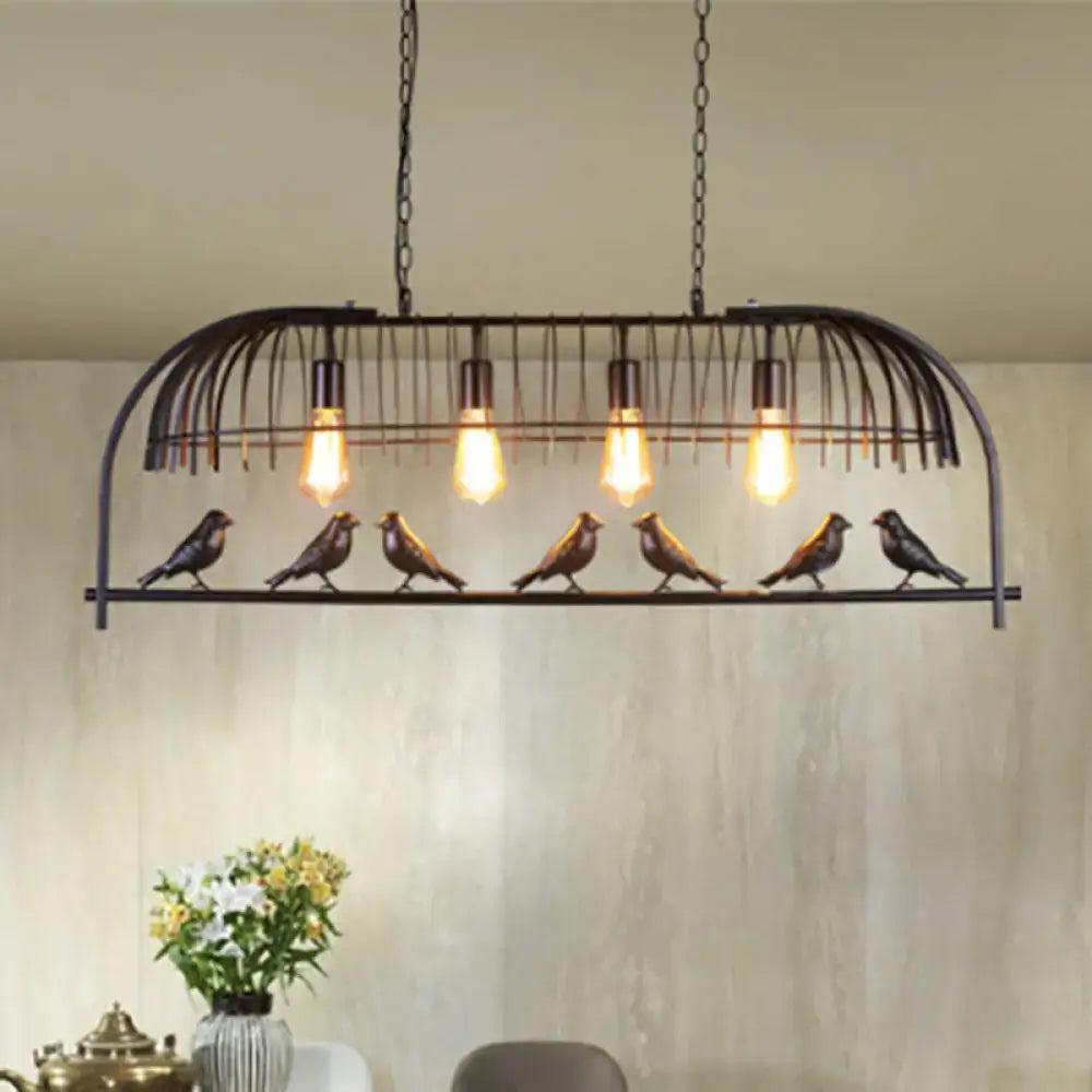 Farmhouse black metal birdcage light fixture with four glowing edison bulbs for dining room ceiling light fixture