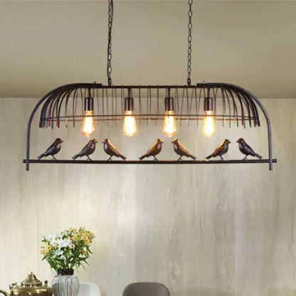Farmhouse black metal birdcage light fixture with four glowing edison bulbs for dining room ceiling light fixture