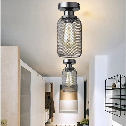 Farmhouse black metal cage ceiling light with industrial mesh design and exposed edison bulb by decorbites black metal