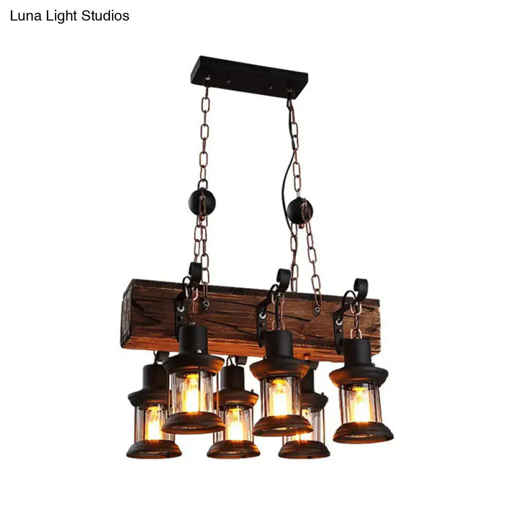 DecorBites farmhouse ceiling pendant light with five clear glass lanterns, rustic wood beam, and black metal chains