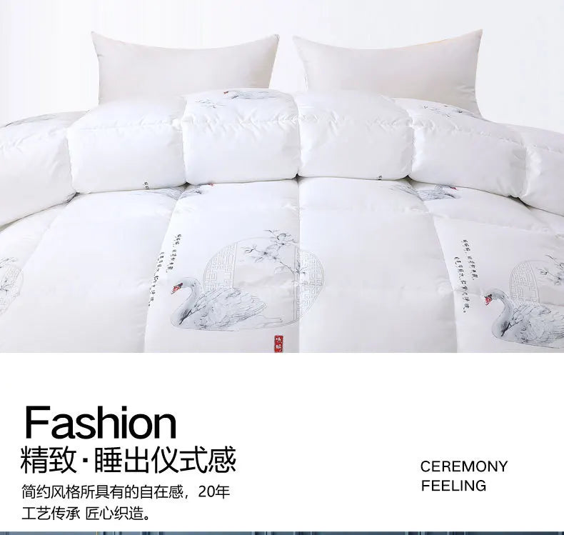 White goose down quilt with elegant black and gray swan ink illustrations and red seal accent for winter bedding