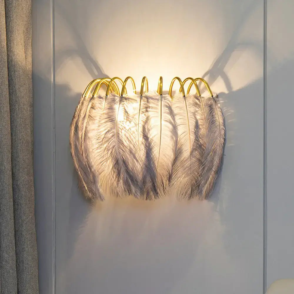 Feather gold wall light fixture with golden wireframe and white gray feathers luxury bedroom wall light sconce