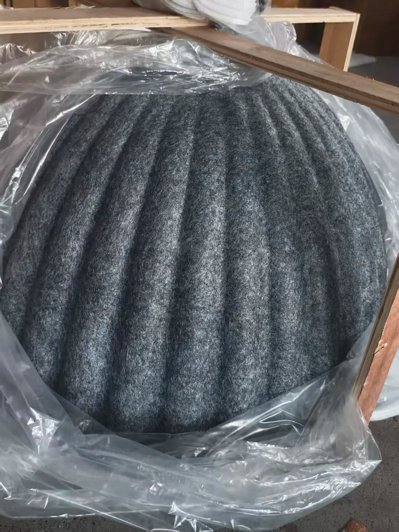 Gray ribbed felt circular cushion for felt pendant light acoustic office providing sound absorption and style