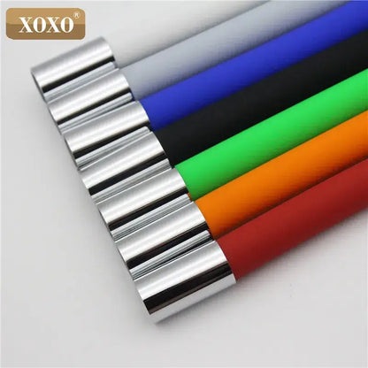 Xoxo brand cylindrical rolls in vibrant colors with metallic silver ends displayed alongside a flexible red silica gel nose kitchen faucet with chrome handle
