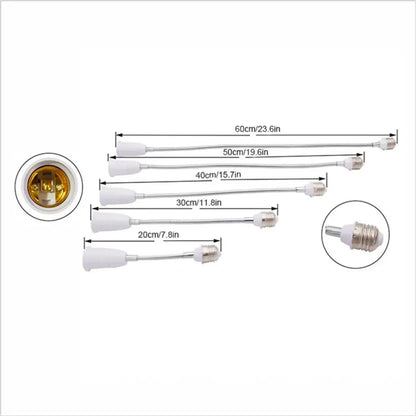 Set of four white plastic and metal e27 base extension adaptors in varying lengths for flexible living room lamp use