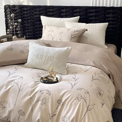 Beige satin egyptian cotton bedding set with black floral embroidery and muse land textured accent pillow