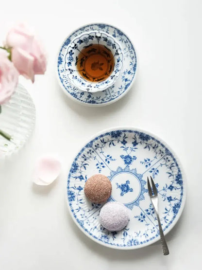Blue and white ceramic dining set with floral hand-painted porcelain tea cup and matching saucer for dining room use
