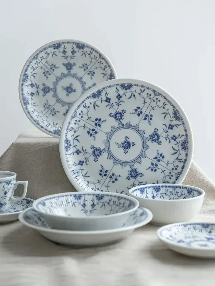 Blue and white porcelain ceramic dining set with delicate floral patterns for elegant dining room use