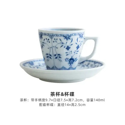 Blue and white porcelain tea cup with delicate floral patterns and matching saucer in ceramic dining set for dining room