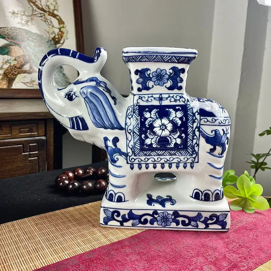 Blue and white porcelain decorbites elephant statue with intricate floral and scrollwork patterns for living room decor