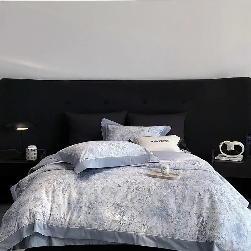 Light blue floral-patterned egyptian cotton bedding set with satin trim and matching pillowcases for bedroom linens