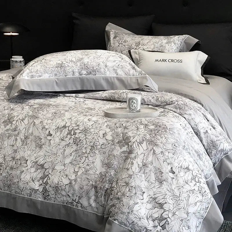 Gray floral-patterned satin egyptian cotton bedding set with black and white botanical design and mark cross pillowcases
