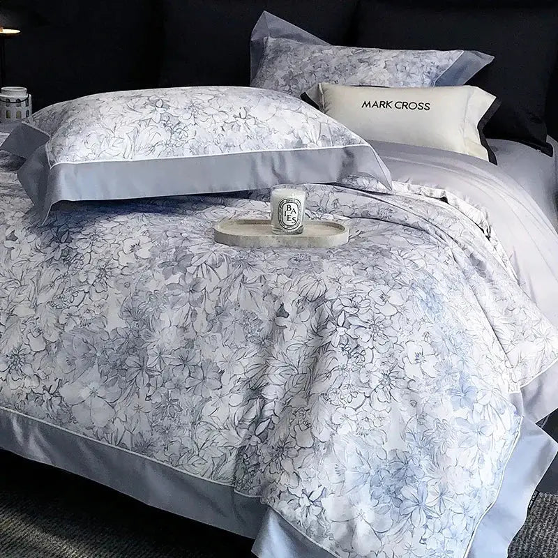 Elegant light blue and white floral patterned egyptian cotton bedding set with satin trim for bedroom linens