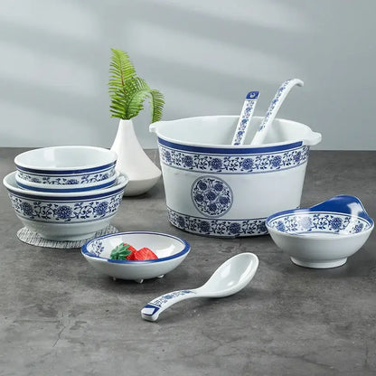 Floral blue and white imitation porcelain dinner set with intricate floral patterns for dining room use