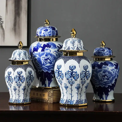 Blue and white porcelain general jar vase with gold-trimmed lids featuring intricate floral patterns for living room decor
