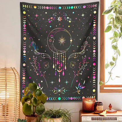 A black floral celestial moon phase tapestry featuring a crescent moon with colorful moon phases for bedroom decorbites decor
