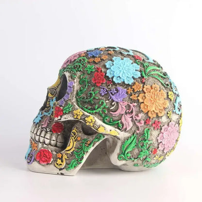 A vibrantly decorated sugar skull ornament with intricate floral patterns in rainbow hues for living room decorbites colorful skull ornaments