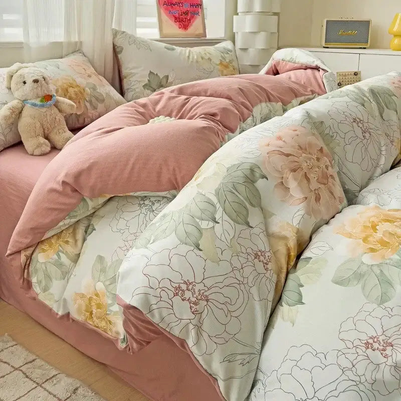 Pastel pink and cream floral quilt cover set with soft embroidered blossoms made of double layer cotton